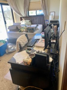 messy guest room/office