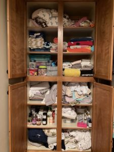 overstuffed cabinet